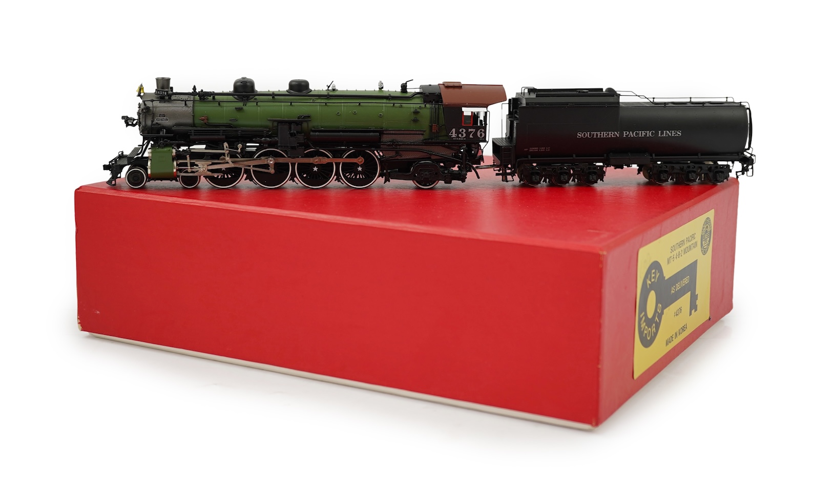 A boxed HO gauge Key Imports model of Southern Pacific Lines MT-5, 4376, 4-8-2 tender locomotive, powered for two rail operation.
